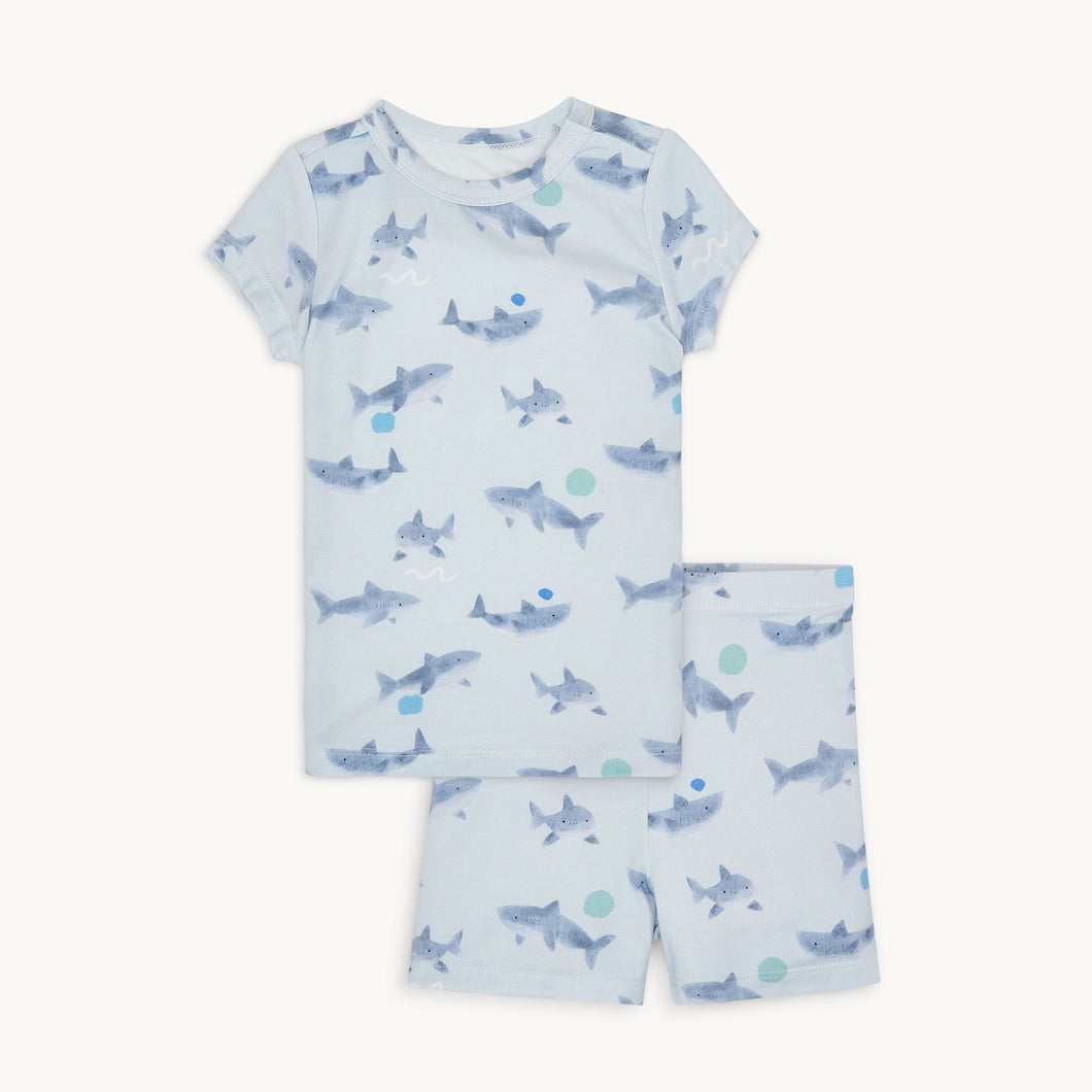Discover comfort and playfulness with the No-Fins Compare to You Pajama Short Set from Magnetic Me. Made with soft modal fabric and featuring a playful shark design, these pajamas will make bedtime a breeze. Get ready for cozy nights and sweet dreams with this must-have set.
