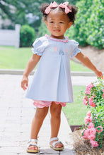 Load image into Gallery viewer, Dress your little one in enchantment with the Infant Girls Magical Bloomer Set from Trotter Street Kids. This charming ensemble includes a soft, short sleeve tunic with delicate front pleats, perfectly paired with coordinating bloomer shorts for ease and comfort. Adorned with embroidered Disney favorites, it brings a touch of magic to every adventure!
