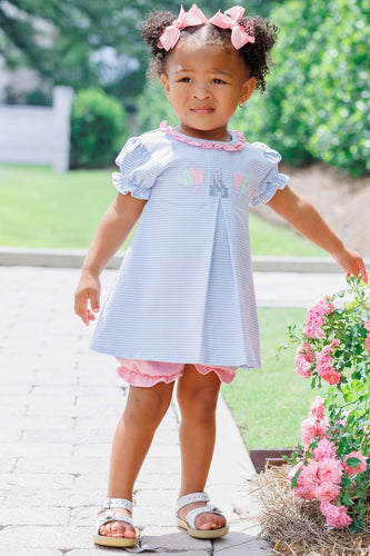 Dress your little one in enchantment with the Infant Girls Magical Bloomer Set from Trotter Street Kids. This charming ensemble includes a soft, short sleeve tunic with delicate front pleats, perfectly paired with coordinating bloomer shorts for ease and comfort. Adorned with embroidered Disney favorites, it brings a touch of magic to every adventure!