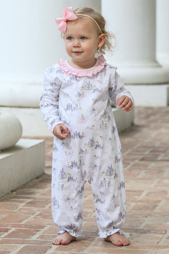 Dress your little one in the charming Once Upon a Time Long Romper from Trotter Street Kids. This romper delights with a delicate pink ruffle neckline and an enchanting allover fairy tale print, perfect for infant girls. Soft and comfortable, it’s designed to keep your baby cozy while adding a touch of storybook magic to her wardrobe. Ideal for everyday wear or special moments, this romper combines sweet style with gentle comfort.