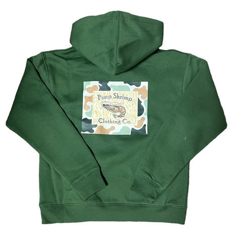 Introducing the Pimp Shrimp Camo Hoodie, now available in youth sizes! Show off your love for this popular brand in a stylish, versatile hoodie. With a unique camo and green design, this hoodie is perfect for any young fashionista. Don't miss out - get yours today!

When you wear Pimp Shrimp Clothing Co. apparel, you are directly helping clean up debris from coastal waters and beaches. We believe in endless Summers, the coastal lifestyle, and giving back to keep that lifestyle great.