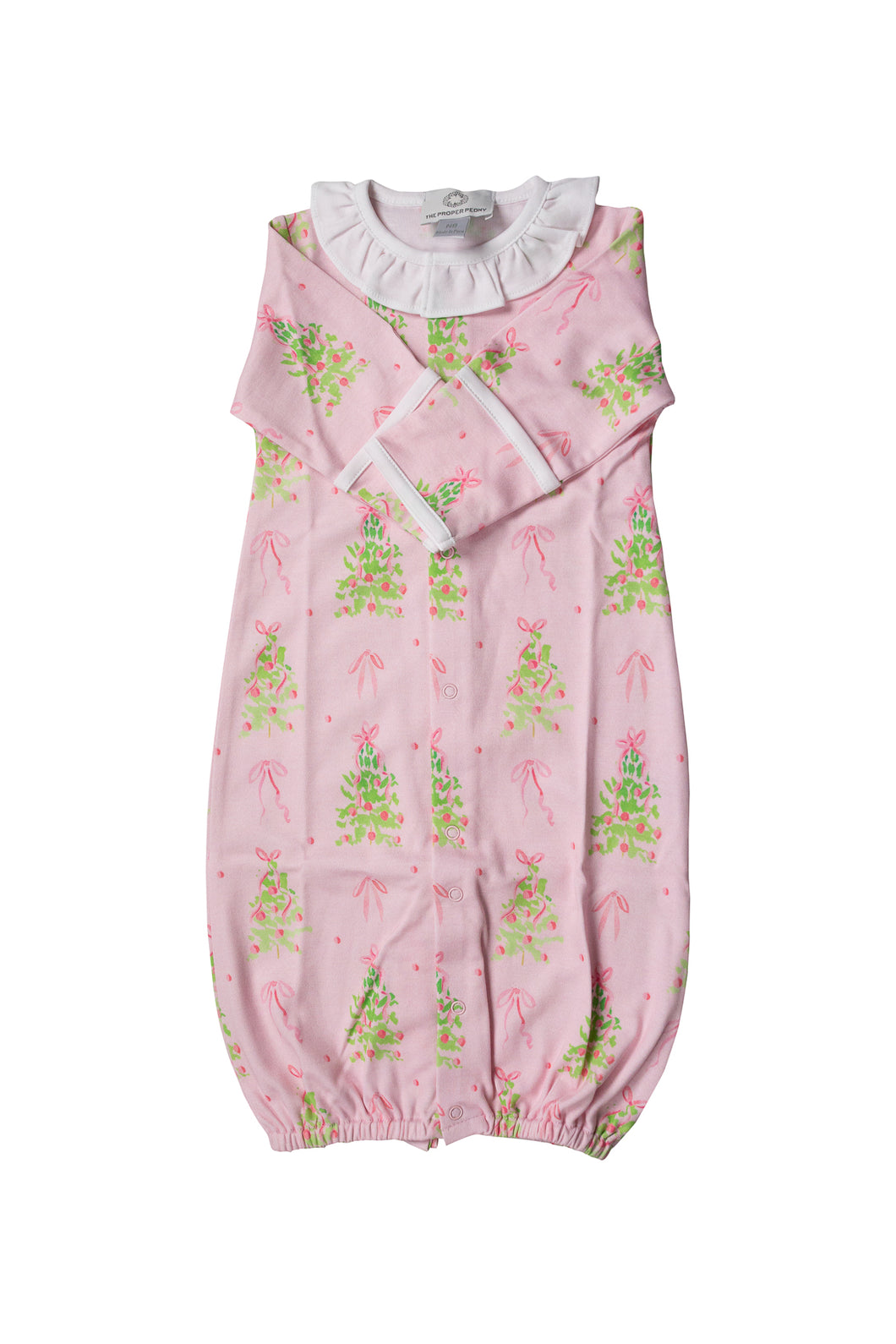 Celebrate the holidays in cozy style with this Infant Girls Pink Tinsel Converter Gown from The Proper Peony. Crafted from 100% pima cotton, its soft pink fabric offers gentle comfort on delicate skin. Adorned with charming Christmas trees decorated in dark pink ornaments, this playful gown adds festive cheer with every wear. The delicate ruffle collar enhances its sweet design, making it perfect for your little one’s holiday moments.