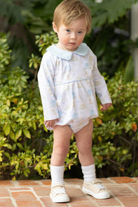 Dress your little one in the adorable Puppy Pals Boys Bubble from Trotter Street Kids. This charming outfit features a pale blue Peter Pan collar and delicate piping detail, perfectly complementing the sweet puppy and dog house print. Designed specifically for infant boys, it combines comfort and cuteness, making it an ideal choice for everyday wear or special occasions. Give your baby a cozy, stylish look that’s sure to capture hearts