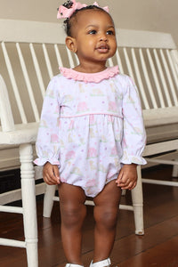 Dress your little one in the adorable Puppy Pals Girls Knit Ruffle Bubble from Trotter Street Kids. This adorable outfit features a pale pink ruffle collar and delicate piping detail, perfectly complementing the sweet puppy and dog house print. Designed specifically for infant girls, it combines comfort and cuteness, making it an ideal choice for everyday wear or special occasions. Give your baby a cozy, stylish look that’s sure to capture hearts