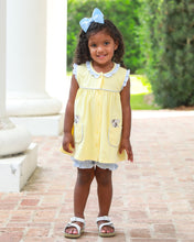 Load image into Gallery viewer, Let your little one prance around in playful style with this charming Puppy Paws Bloomer Set from Trotter Street Kids. The cheerful yellow tunic features adorable applique puppies sitting right on the side pockets—a delightful detail that captures every child's imagination. Paired with coordinating striped bloomers.
