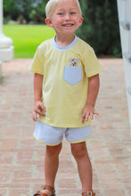 Load image into Gallery viewer, Your little one will love this adorable Puppy Paws Short Set from Trotter Street Kids. The cheerful yellow tee features a charming puppy design perched playfully above the coordinating pocket, paired with matching striped shorts for a coordinated look.&nbsp;
