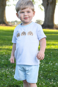 Adorable Puppy Trio Embroidered Toddler Boys Shorts Set&nbsp; from Trotter Street Kids offers a charming blend of comfort and cuteness for toddlers. The soft knit shirt in blue and white is accented with a coordinating short and sweet puppy embroidery. Perfect for any little puppy lover!