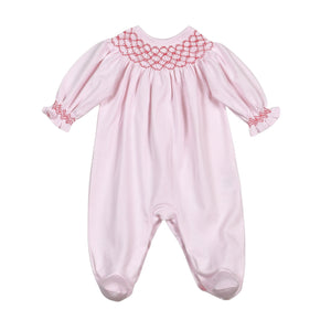 Dress your little one in timeless charm with the Infant Rosy Holiday Bishop Footie from Baby Loren. This delicate pink footie features hand-smocked detailing and elegant red embroidery, creating a subtle yet classic holiday look. Designed for comfort and style, it’s perfect for festive occasions or everyday wear, ensuring your baby stays cozy and adorable all season long.