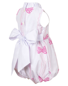 Dress your infant girl in the adorable Ada Ribbons &amp; Bows Bubble from The Yellow Lamb. This charming bubble style outfit features a pink bow and ribbon design and a back bow tie. Don't forget to grab the matching Ada Ribbons &amp; Bows Dress for a sibling set!