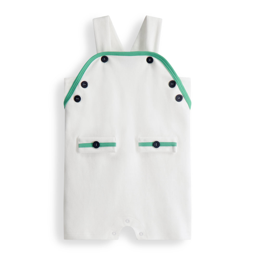 Elevate your baby boy's summer wardrobe with our Infant Boy's White Pique Romper from bella bliss! Keep him cool and stylish in this classic outfit, perfect for any occasion. Complete the look with our Footmates Tide Sandals. Don't miss out on this must-have summer essential!