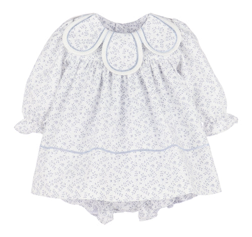 The Floral Branches Petal Float Dress from Sophie & Lucas brings a charming touch to your little one’s wardrobe with its delicate blue and white floral pattern. Its petal scalloped collar adds a sweet, elegant detail, while the back tie ensures a comfortable, adjustable fit. Available in sizes from infant to toddler, this dress is the ideal choice for family photos, capturing timeless memories with style and grace.