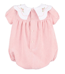 Dress your little one in cozy charm with the Floral Corduroy Scallop Bubble in Pink from Sophie &amp; Lucas. Crafted from soft pink corduroy, this short-sleeve bubble features a delicate scalloped collar adorned with floral embroidery, adding a timeless touch. Perfect for fall, it combines classic style with gentle comfort, making it an irresistible choice for your youngest's wardrobe.
