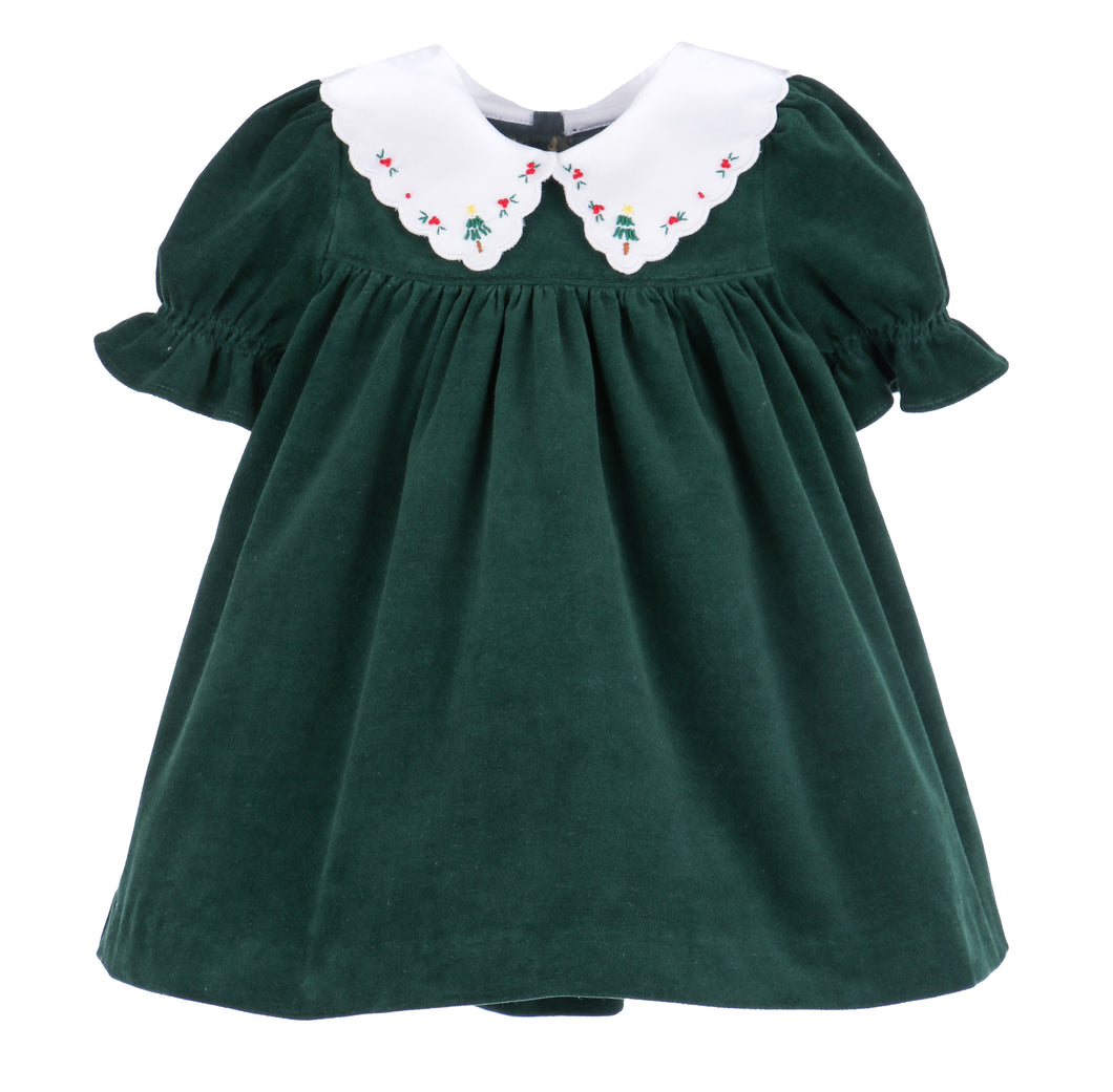 Elevate your little girl's festive wardrobe with the Girls Holly Jolly Velvet Miller Dress from Sophie & Lucas. Crafted from rich dark green velvet, this dress features a charming white scalloped embroidered collar that adds timeless elegance. Perfect for holiday gatherings, it pairs beautifully with the boys Holly Jolly Bubble for coordinated family photos. Soft, stylish, and comfortable, this dress is sure to make her the center of attention this season.