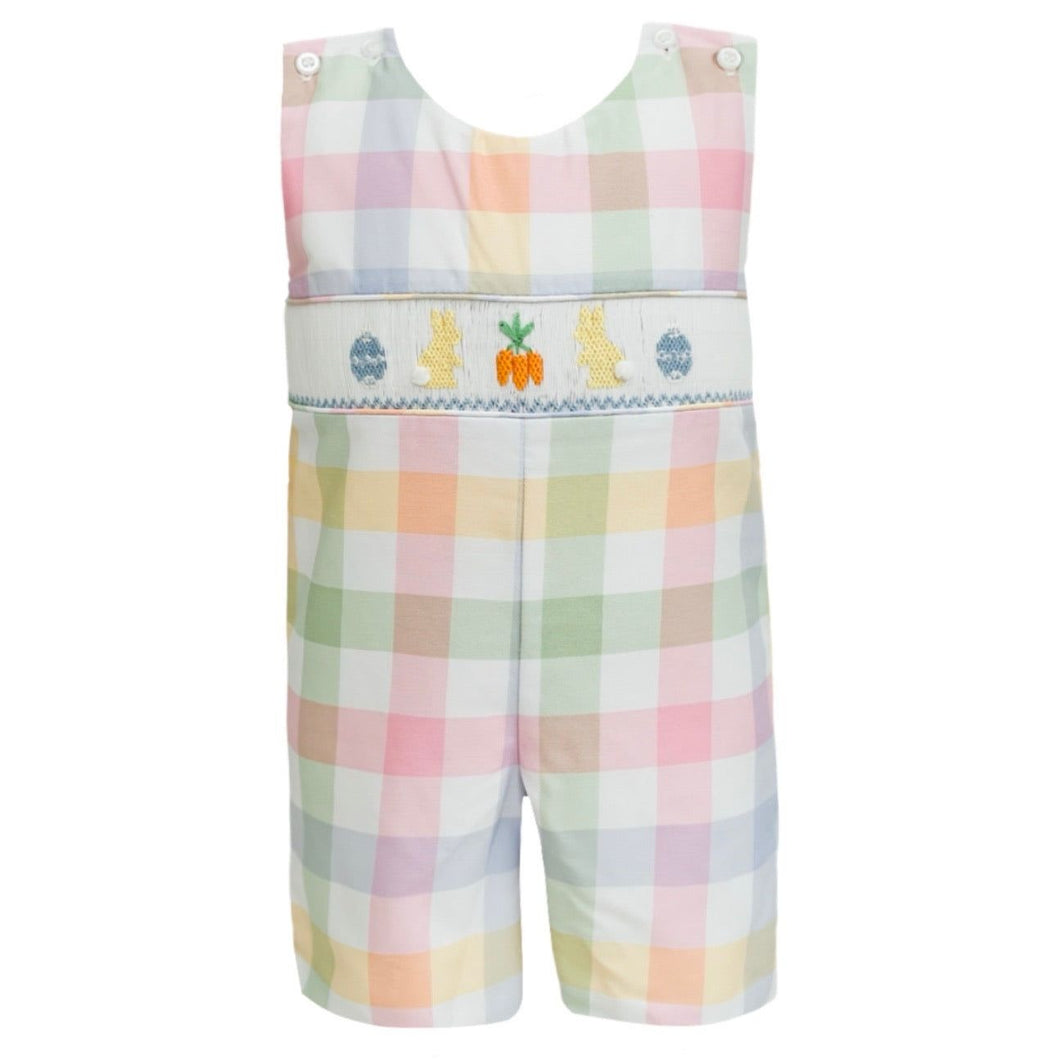 Get ready for Easter Sunday with our Smocked Bunny Garden Plaid Jon Jon! This adorable outfit, designed for infant and toddler boys, features a plaid design with and smocked bodice, with embroidered bunnies, eggs, and carrots for Easter! This Jon Jon is perfect for your little one to hop into spring with style. 