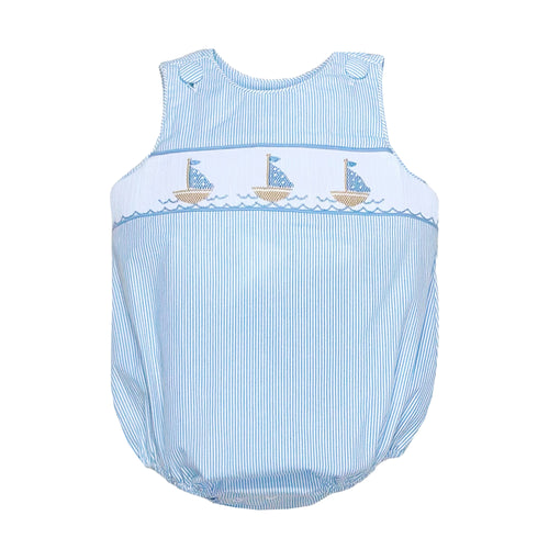 Sail into summer with our Infant Boy's Christopher Striped Sailboat Sunsuit! This charming outfit features delicate light blue and white seersucker stripes that keep your little one cool and stylish. The beautifully smocked front showcases adorable embroidered sailboats that capture the essence of seaside adventures. Complete your family photos with matching sibling sets from our Zuccini Kids collection – the perfect choice for beach days, special occasions, or simply looking precious!
