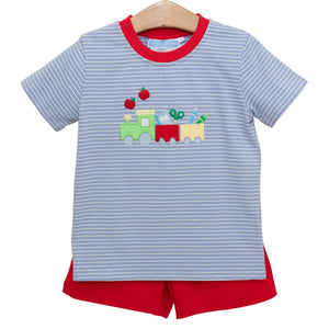 Transform your little boy's back-to-school excitement with this irresistible Trotter Street set! The blue and white striped tee showcases an adorable train applique hauling school supplies, perfectly paired with bright red shorts for a look that's both playful and stylish. Designed specifically for toddlers who love locomotives, this outfit will have your little conductor beaming with confidence as he chugs into the new school year. An absolute must-have for any train-loving tot!