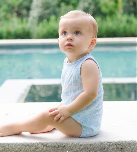 Bring your little one's beach style to life with the Sandcastles Blue Reid Bubble from Lila & Hayes. In a stunning ocean blue hue and adorned with a bright sandcastle design, this adorable outfit is perfect for any seaside adventure. Make memories in style with this must-have for infants.