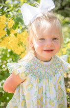 Load image into Gallery viewer, Brighten her wardrobe with the Infant Girls Lemon Hallie Bubble from Shop Teeta. This charming piece features a delicate smocked neckline and a vibrant lemon print that captures playful summer style. The classic bubble silhouette offers comfortable, easy movement—perfect for active little ones. Soft and versatile, it pairs beautifully with basics for everyday wear or dressed up for special occasions. A timeless addition to any infant girl's closet.
