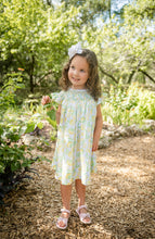 Load image into Gallery viewer, Brighten her wardrobe with the Girls Smocked Lemons Kate Dress from Shop Teeta. This charming dress features a delicate smocked neckline and a vibrant lemon print that captures playful summer style. The classic silhouette offers comfortable, easy movement—perfect for active little ones. Soft and versatile, it pairs beautifully with basics for everyday wear or dressed up for special occasions. A timeless addition to any girl's closet.
