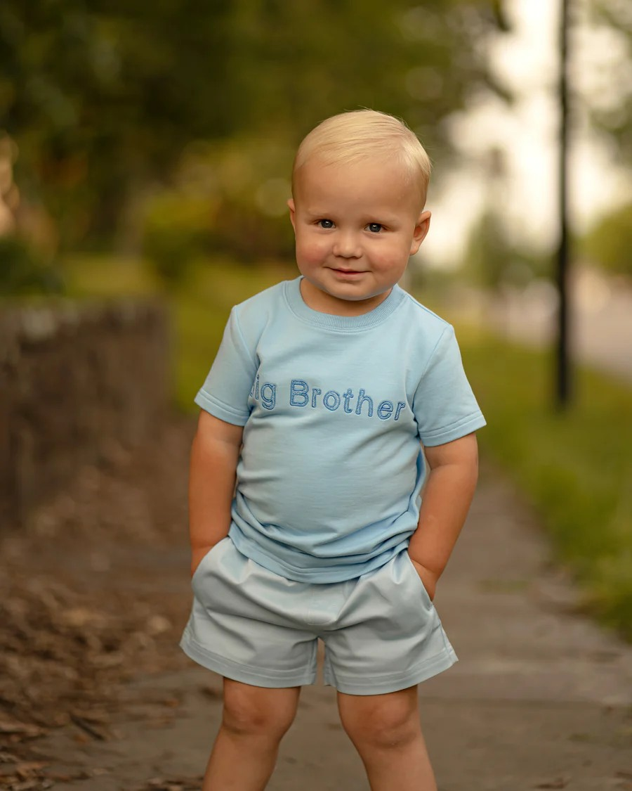 Big announcement for your little boy turning Big Brother! Custom Big Bother embroidery on chest. Comfortable polyester spandex blend knit shirt with straight sleeves and crew neck.