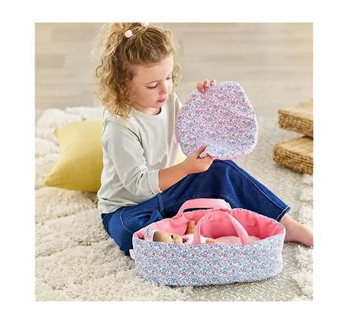 Inside this wonderfully soft cloth bed is plenty of space for your favorite 12-inch baby doll to rest comfortably, plus a thick double-sided blanket to keep them nice and warm. Ready to go? Just grab the carrying handles and head out the door! Toys. Dolls & Dollhouses. Pretend Play & Imaginative Play.