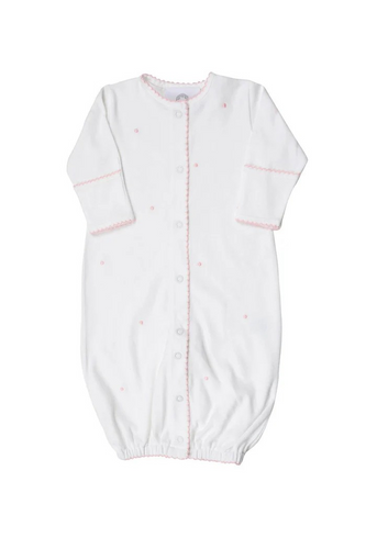 Introducing the Scallop Dot Converter- Pink Dots: a versatile and timeless gown for infant boys from The Proper Peony. With its unique design, this gown easily converts into a romper, providing both style and practicality. Made with love and care for your little one's comfort.