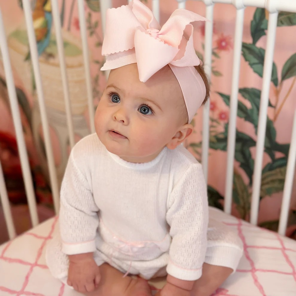 Beautiful Swiss Floral Romper from Paty, a customer favorite! Elegant and sweet romper to take her out and about to see this brand new world. Made in America.