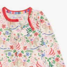 Load image into Gallery viewer, The Sugar Plum Dreams Convertible Footie makes bedtime effortless with a magnetized top that opens swiftly for easy, diaper changes and dressing. Crafted from durable modal fabric, these pajamas offer a silky soft feel and comfortable stretch. Featuring a charming and sophisticated Christmas holiday print, they combine style with sustainability for cozy nights. Feet convert to full footie to keep her cozy and warm all night.
