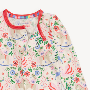 The Sugar Plum Dreams Convertible Footie makes bedtime effortless with a magnetized top that opens swiftly for easy, diaper changes and dressing. Crafted from durable modal fabric, these pajamas offer a silky soft feel and comfortable stretch. Featuring a charming and sophisticated Christmas holiday print, they combine style with sustainability for cozy nights. Feet convert to full footie to keep her cozy and warm all night.