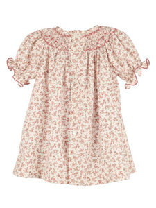 This delightful fall-inspired dress showcases a vintage-like floral pattern that's just perfect for your little princess! With adorable puffy short sleeves, intricate smocking details, and a charming design, the Mulberry floral dress will have your tiny fashionista twirling with joy all season long.