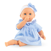Load image into Gallery viewer, Meet Bébé Calin Milly, the perfectly sized companion for young doll enthusiasts. Milly mimics real baby movements—she sits independently, sleeps when laid on her back, and even enjoys her thumb or pacifier. Her delicate features include soft-touch vinyl skin, peaceful blue eyes, and that signature vanilla scent Corolle is known for. Dressed in an adorable blue gingham outfit with matching headband.
