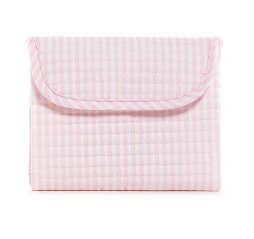 The Pimlico Stripe Pink Quilted Changing Pad from TRVL Design offers a stylish and practical solution for on-the-go diaper changes. Its soft, quilted fabric ensures comfort for your baby while being easy to clean for busy parents. Pair it with the Quilted Stroller Bag and Everyday Bag to create a coordinated set that combines convenience with chic design, making every outing smoother and more fashionable.