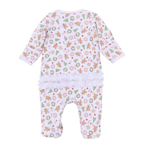Dress your baby girl in cozy comfort and festive charm with this Frosted Wonderland footie. Made from 100% soft, breathable Pima Cotton, it gently caresses delicate skin while keeping your little one comfortable all day. The delightful all-over print of gingerbread girls, stars, snowflakes, and ruffle back adds a sweet holiday touch, making it the perfect choice for seasonal celebrations and cozy winter moments. Sibling matches available!