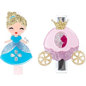 Transform any hairstyle into a magical fairy tale with Glass Slipper Princess &amp; Carriage Hair Clips from Lilies &amp; Roses. These 100% acrylic charm clips feature a nickel-free snap clip base and are sold as a pair. Perfect for adding a touch of fantasy to any outfit!