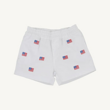 Load image into Gallery viewer, Our Critter Sheffield Shorts are just as practical as they are adorable! Featuring Worth Avenue White twill fabric with American Flag Embroidery and Richmond Red Stork, these are a must-have for Memorial Day and July 4th! Pair with the Prim &amp; Proper Navy Polo for the perfect look!!
