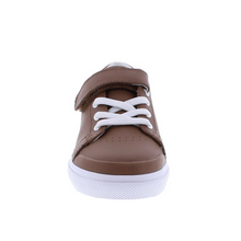 Load image into Gallery viewer, Footmates Reese Brown Leather Sneaker- Leather blucher oxford vulcanized sneaker featuring hook-and-loop closure and decorative elasticized false-laces.
Custom Fit System – Removable,&nbsp;dual&nbsp;insoles in Medium and Wide provided for customized fitting.
Roomy Toe Box – Allows tiny toes room to breathe and splay naturally during walking, enhancing balance and reducing rubbing, friction, and moisture.
Arch Support – Shoe last and insole designed to provide proper arch support for developing feet.
Firm He
