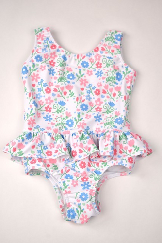 Get ready to make a splash with our Floral Ruffle One Piece Swimsuit! Designed by Funtasia Too, this adorable swimsuit features a cute pink, blue and green floral design on a white background and ruffle waist accent.