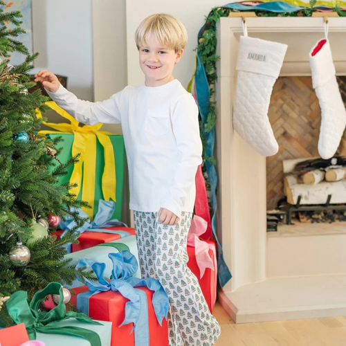 The Beckett Boys' Hangout Pant in Under the Christmas Tree print by Lila & Hayes offers comfort with a convenient drawstring waistband. Crafted from 100% Peruvian cotton, these pants are soft and durable. These pants make the perfect holiday loungewear!