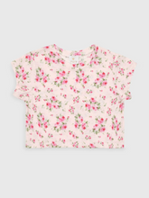 Load image into Gallery viewer, The Girls Ellie Slouch Tee from J. Marie brings effortless style to her everyday wardrobe. Featuring a charming pink floral print on a relaxed slouch silhouette, this tee is designed for the modern tween who loves comfort without compromising on trend. The laid-back fit pairs perfectly with the Ellie Athletic Skirt for a coordinated floral look, or works beautifully on its own with her favorite bottoms. Versatile, comfortable, and on-trend—this tee is ready for everything from school days to weekend adventu
