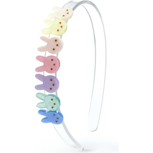 Indulge in playful and stylish accessorizing with the Bunny Peeps Acrylic Headband from Lilies &amp; Roses. Made with love and attention to detail, this headband adds a touch of whimsy to any outfit. Embrace the joy and charm of spring with this must-have accessory!