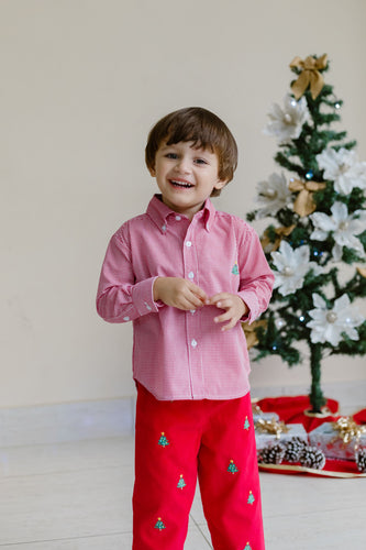 Celebrate the season in style with the Boy's Christmas Tree Alton Gingham Shirt from Zuccini Kids. This charming red and white gingham button up shirt t is adorned with a festive Christmas Tree embroidered detail. This shirt is the perfect holiday outfit for your son to shine and coordinate perfectly with sibling looks. Pair with the Christmas Tree Red Corduroy Pants.