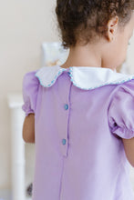 Load image into Gallery viewer, The Ice Queen Bryar Dress from Zuccini Kids combines cozy lavender corduroy with a charming Ice Queen applique, making it perfect for your little one to sparkle and stand out. Designed to inspire imagination and comfort, this dress lets your child embrace the magic of playtime. Pair it with the matching legging set available for younger toddlers to complete the enchanting look.
