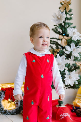 Dress your little one in festive charm with the Christmas Tree Ashton Corduroy Longall from Zuccini Kids. Made from soft red corduroy, this longall is embroidered with charming Christmas trees, creating a classic holiday look. Perfect for sibling coordinating outfits, it pairs beautifully with a Peter Pan collar shirt for an extra touch of timeless style. Celebrate the season in comfort and joy with this adorable holiday staple.