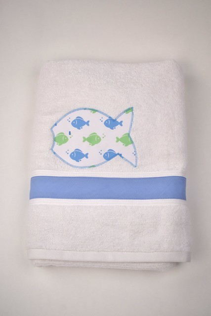 Find your perfect beach companion with our Embroidered Beach Towel from Funtasia Too! Featuring a stunning embroidered fish design on a white towel, this classic beach essential is available in three vibrant colors and designs. Experience comfort and style on your summer days with this must-have beach towel.