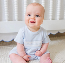 Load image into Gallery viewer, The sweetest baby boy romper you ever saw! Your little prince will capture the hearts of everyone who sees him in this dainty little outfit. With smocking, argyle embroidery, your baby boy will steal the show!
