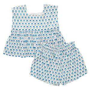 Shorts And Sweet! The Girls Kamari 2-Piece Set adds an easy to wear elastic waist bottom, adorned with a faux pattern on pattern tie, to our already well loved breezy Kamari top. The boxy fit, sleeveless top features a square neckline and a silver glitter button keyhole closure at the back. This fresh ensemble embodies our free spirted summer attitude and is perfect for all sorts of adventures, indoors and out.