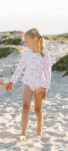 Get ready to make a splash with our Floral Rash Guard One Piece Swimsuit! Designed by Funtasia Too, this adorable swimsuit features a cute pink, blue and green floral design on a white background. The rash guard style and ruffle waist accent make it both stylish and practical for your little one. Dive in now!