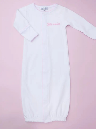 ntroducing the Little Sister Converter, a must-have for any new baby sister! This white converter from Magnolia Baby features delicate pink embroidery, making it the perfect canvas for a personalized monogram. 