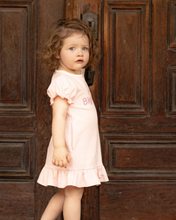 Load image into Gallery viewer, A sweet dress for the most precious Big Sister announcement! Ultra comfortable knit fabric with princess sleeves with elastic cuffs, crew neck with single button back closure. Fun ruffled dress hem. Custom bow and big sister embroidery on chest. Polyester spandex blend knit.
