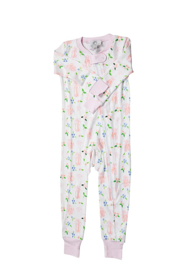 Dress your little one for sweet dreams with the Infant Girls En Pointe Zipper Pajamas. Crafted from 100% soft Pima cotton, this zipper pajama ensures gentle comfort all night long. The charming ballet print adorned with delicate pink bows adds a graceful touch, making bedtime feel special and playful. With a convenient zipper, changing is quick and easy, so she can dance right into a cozy, peaceful sleep.